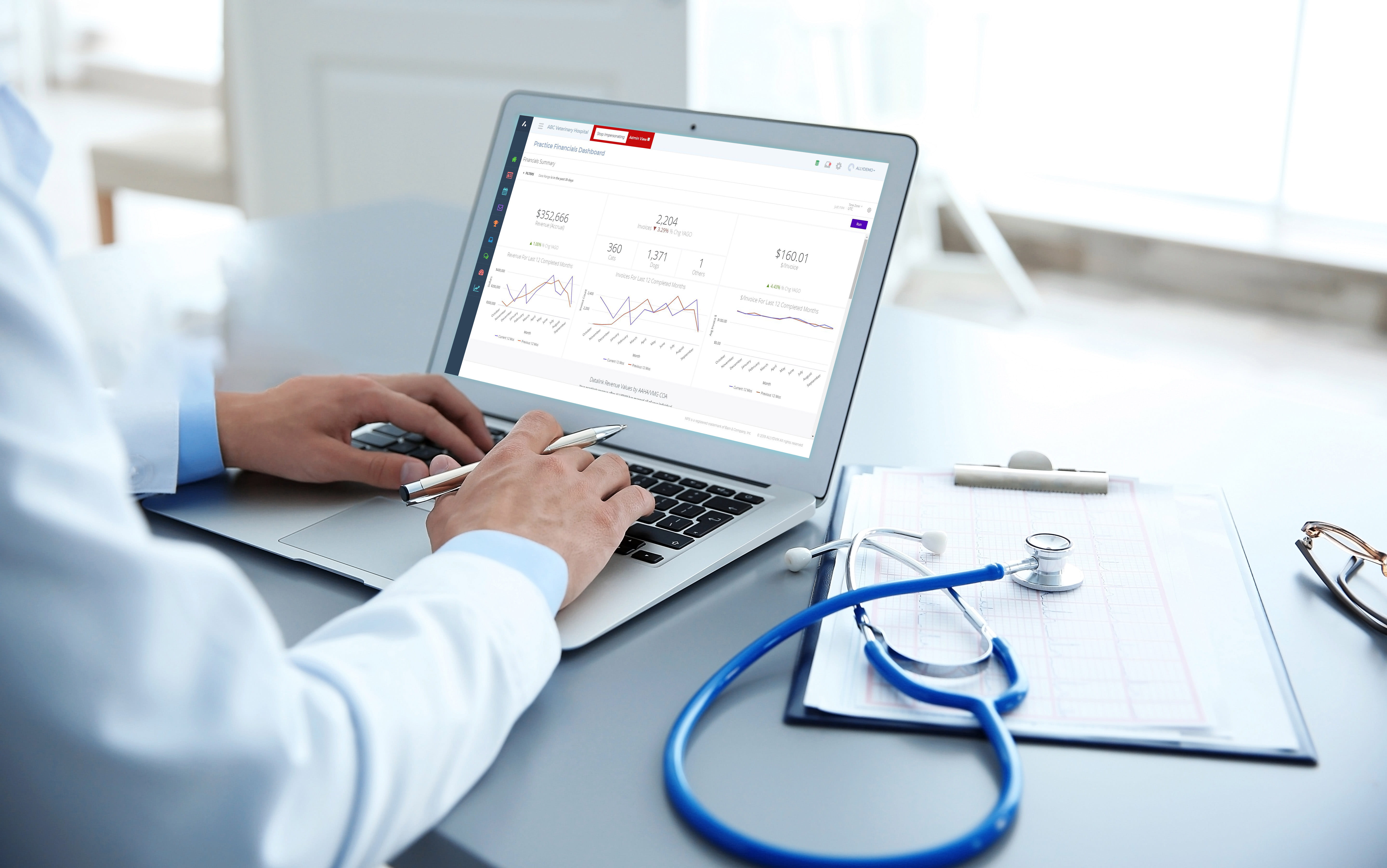 vet looking at data analytics on his laptop